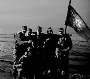 soldiers posed for me as they planted the UN flag